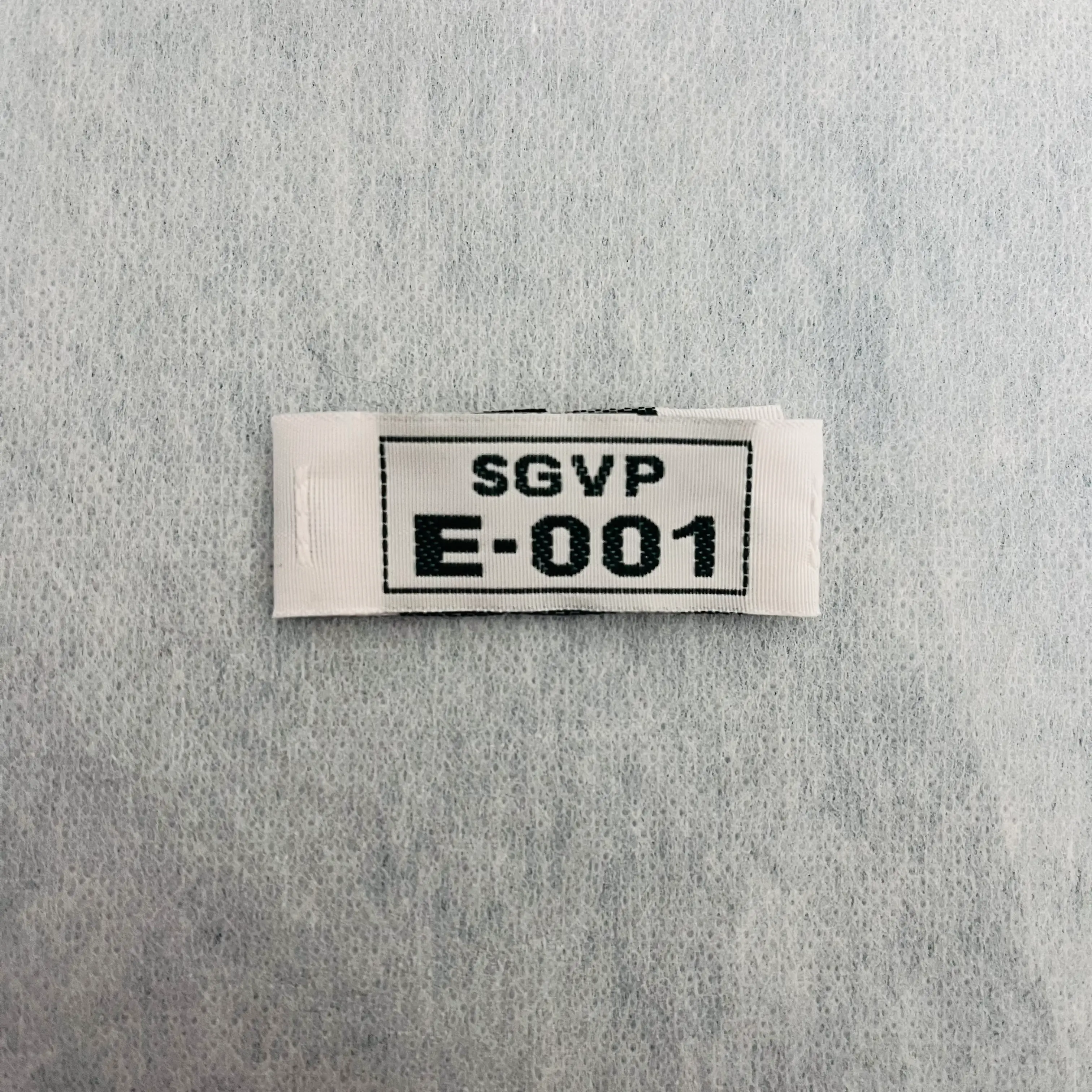 Custom woven name and number label SGVP E-001 for school uniform identification