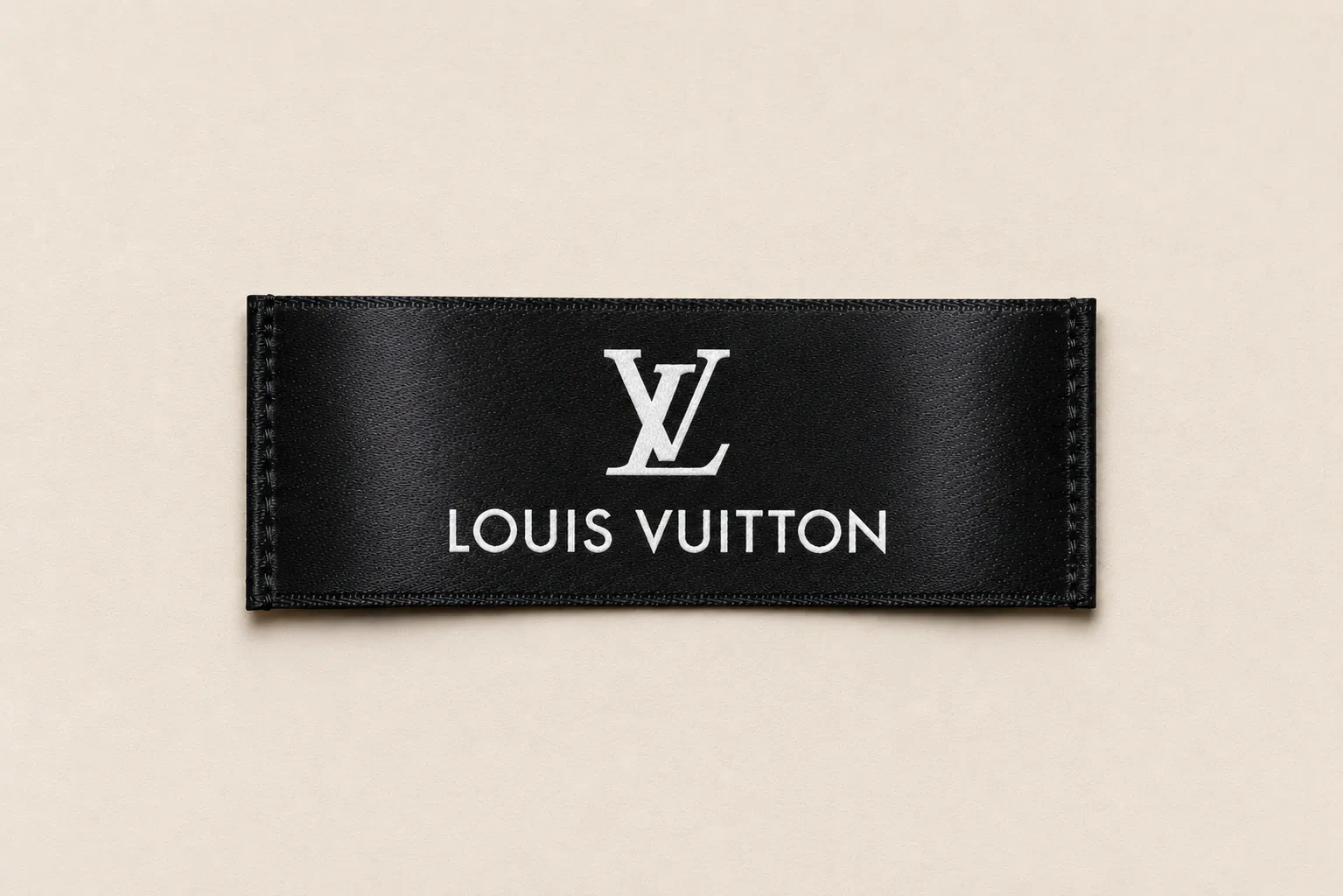 Custom satin printed Labelwala brand label with hand-illustrated floral border — example of a premium satin printed label
