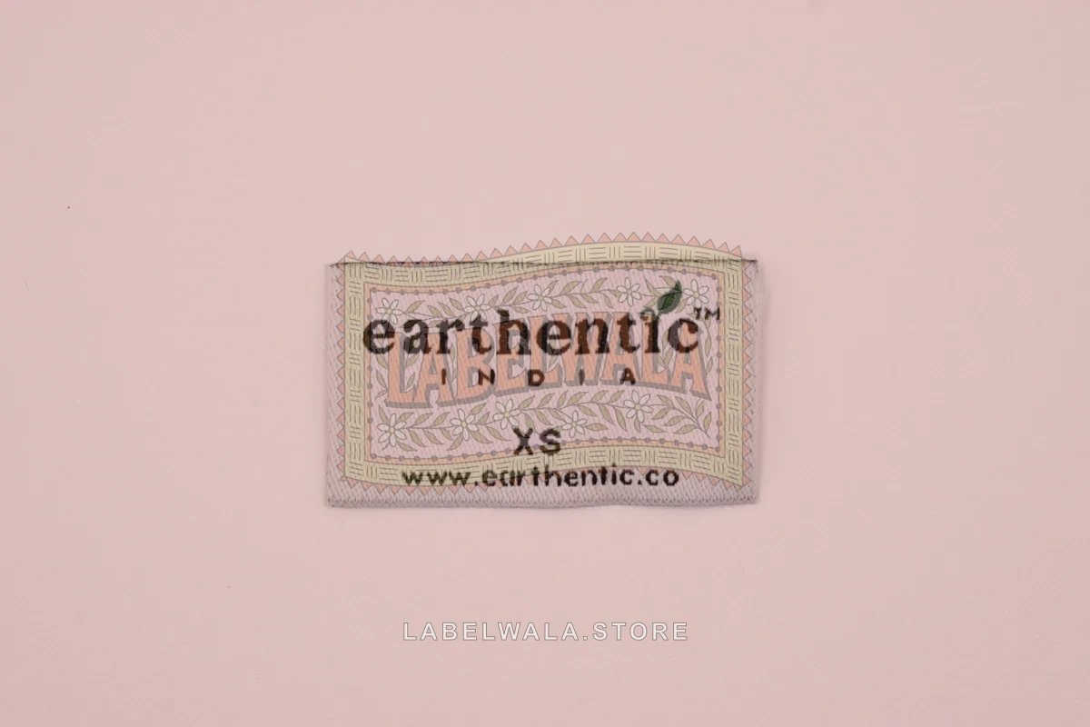 Earthentic woven die cut label, made in Ahmedabad: front view