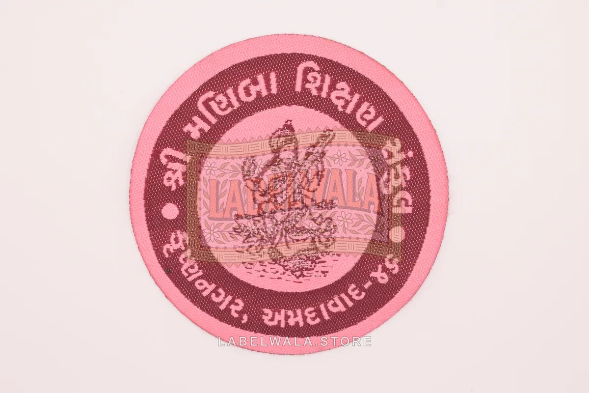 Manima woven die cut label, made in Ahmedabad: front view