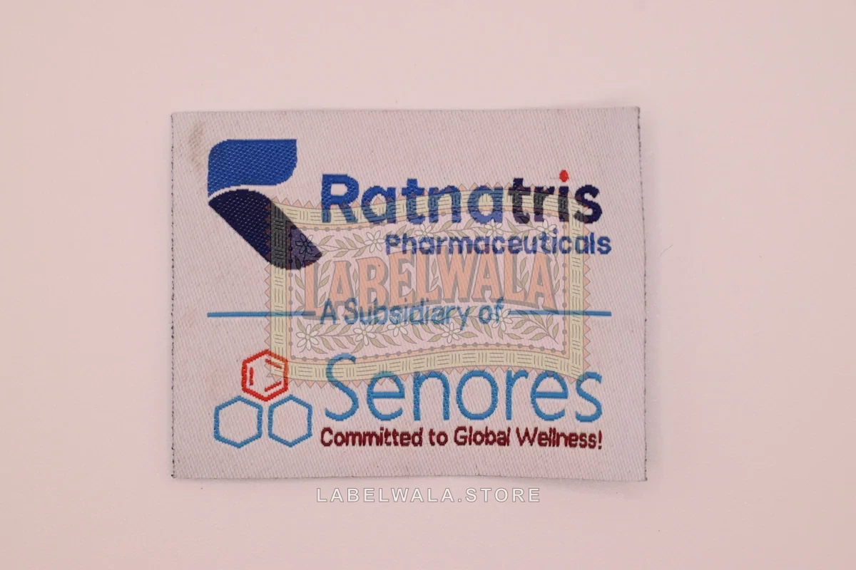 Ratnatris woven die cut label, made in Ahmedabad: front view