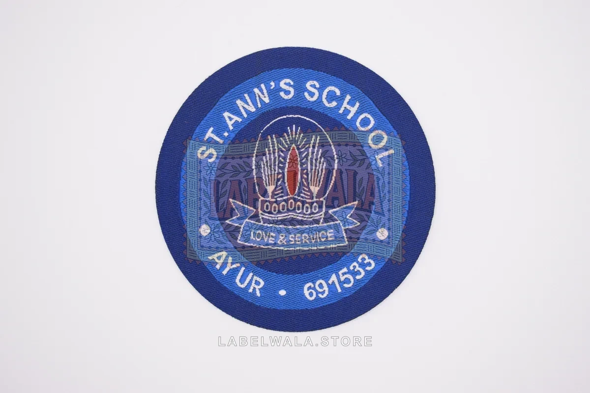 St.Ann's School woven die cut label, made in Ahmedabad: front view