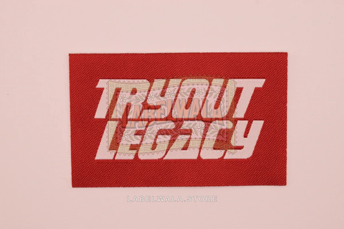 Tryout red woven die cut label, made in Ahmedabad: front view