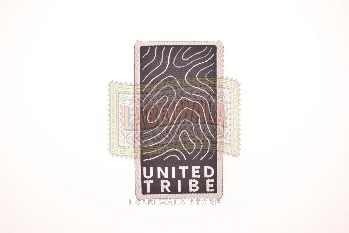 United woven die cut label, made in Ahmedabad: front view