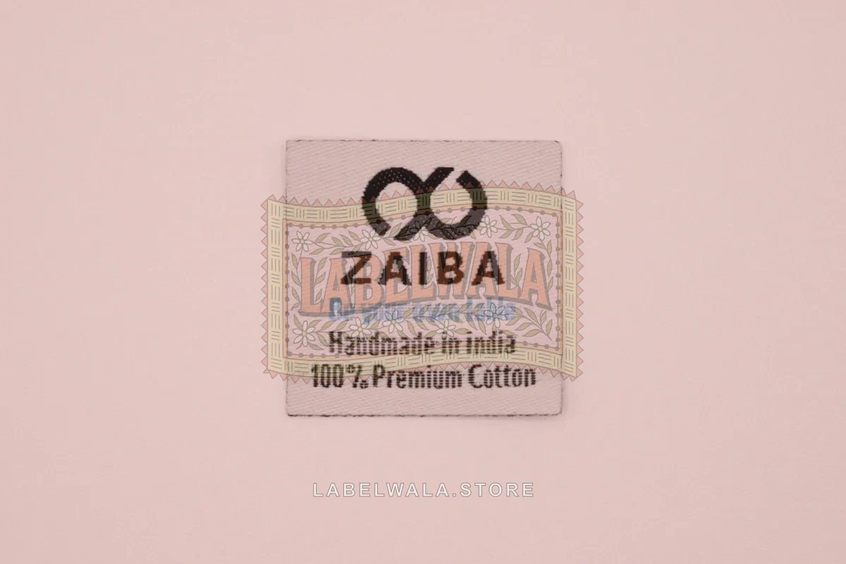 Zaiba woven die cut label, made in Ahmedabad: front view