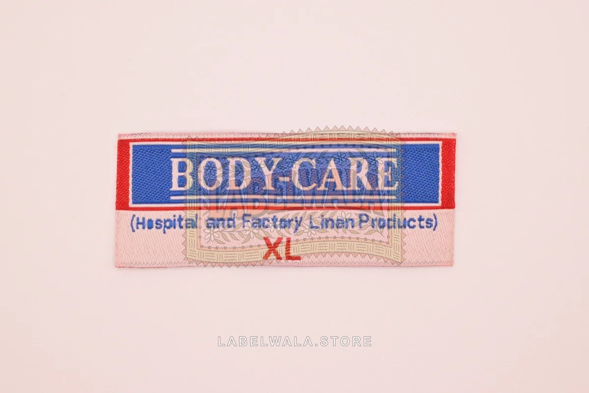 Body Care XL woven end fold label, made in Ahmedabad: front view