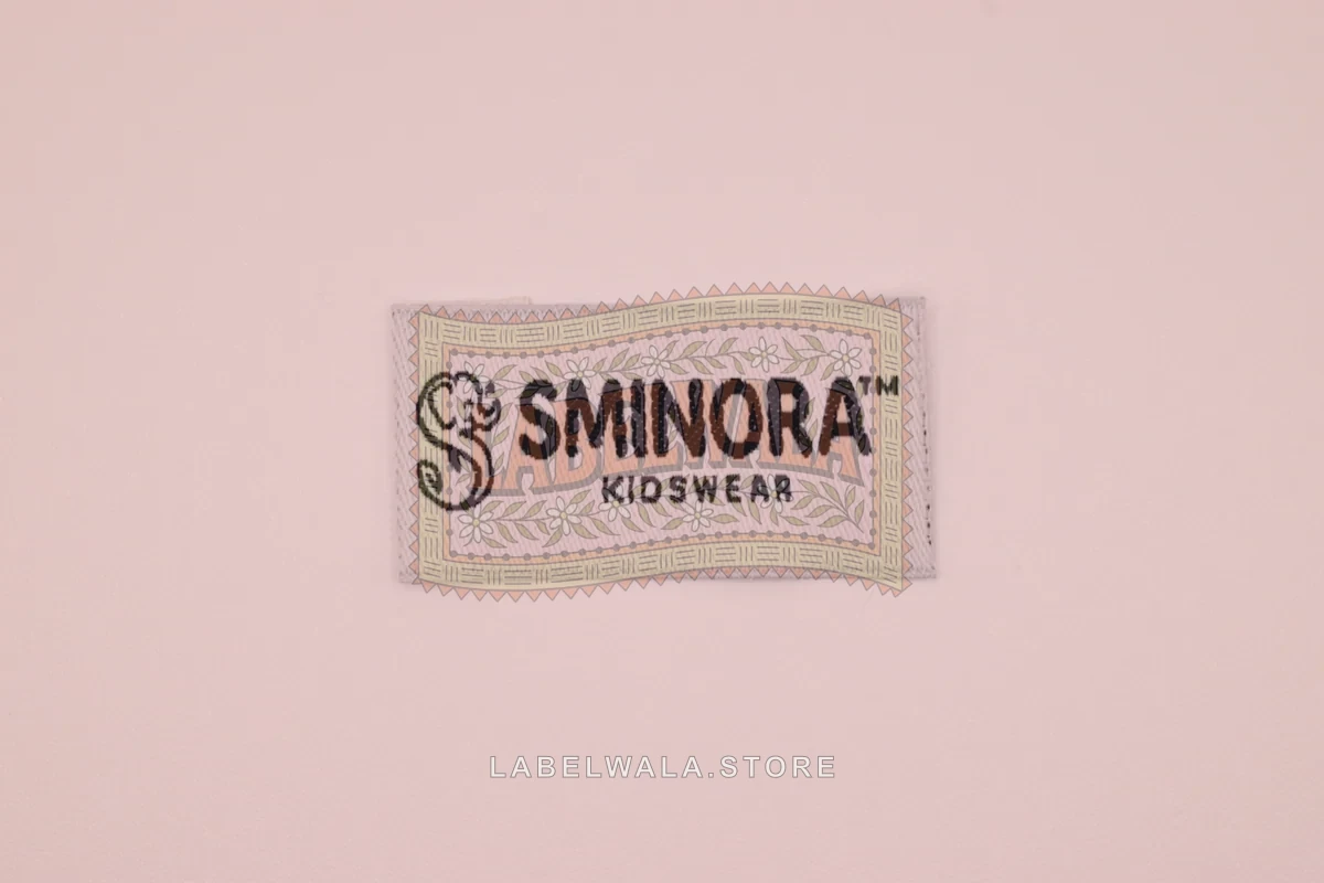 Sminora woven end fold label, made in Ahmedabad: front view