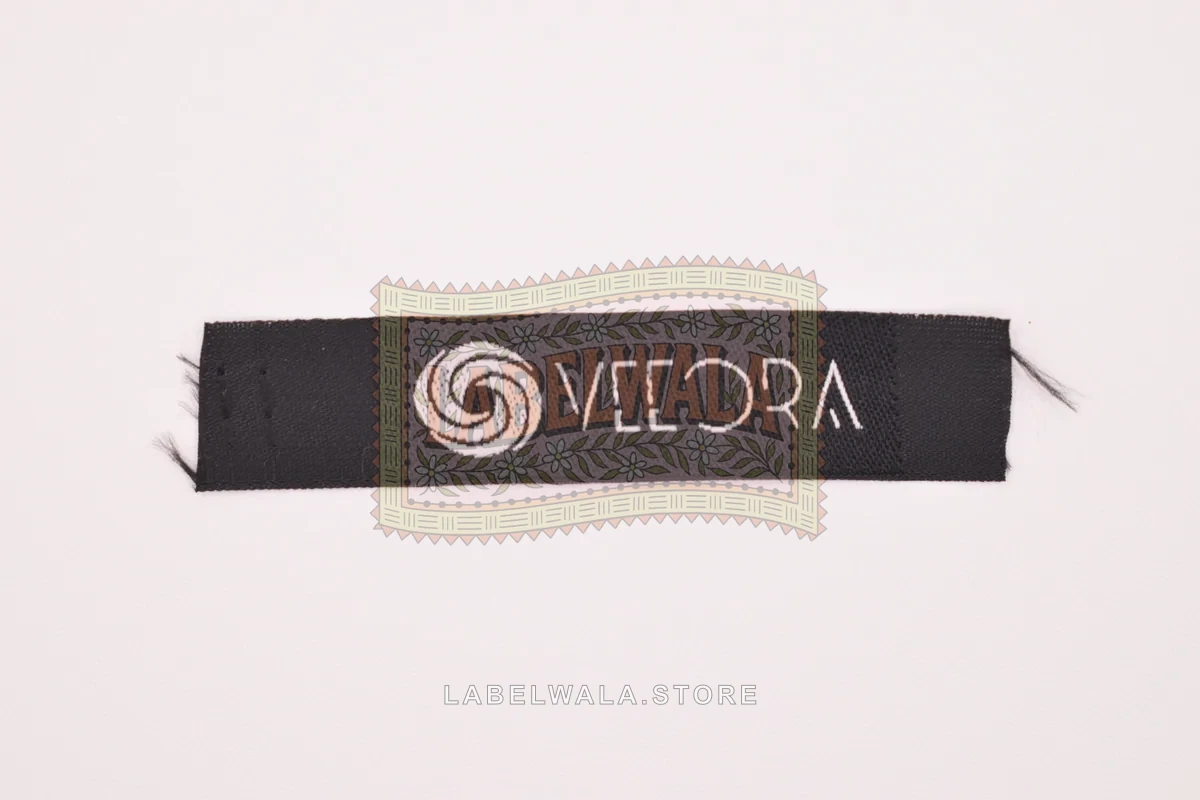 Veeora woven end fold label, made in Ahmedabad: front view