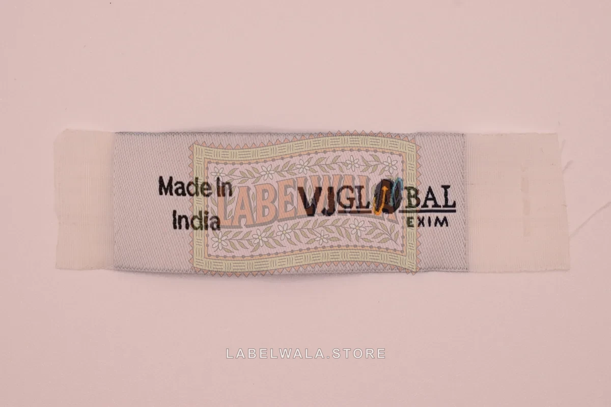 VJGlobal woven end fold label, made in Ahmedabad: front view