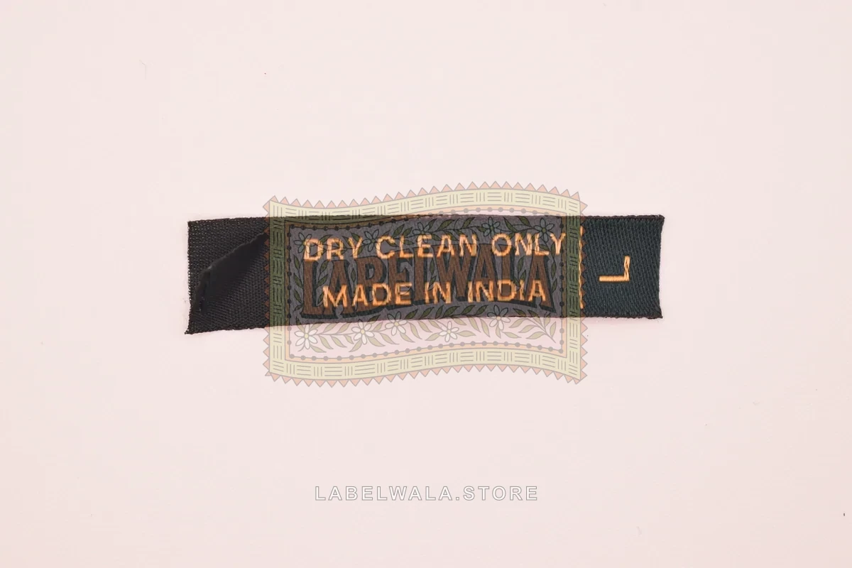 DCO woven center fold label, made in Ahmedabad: front view