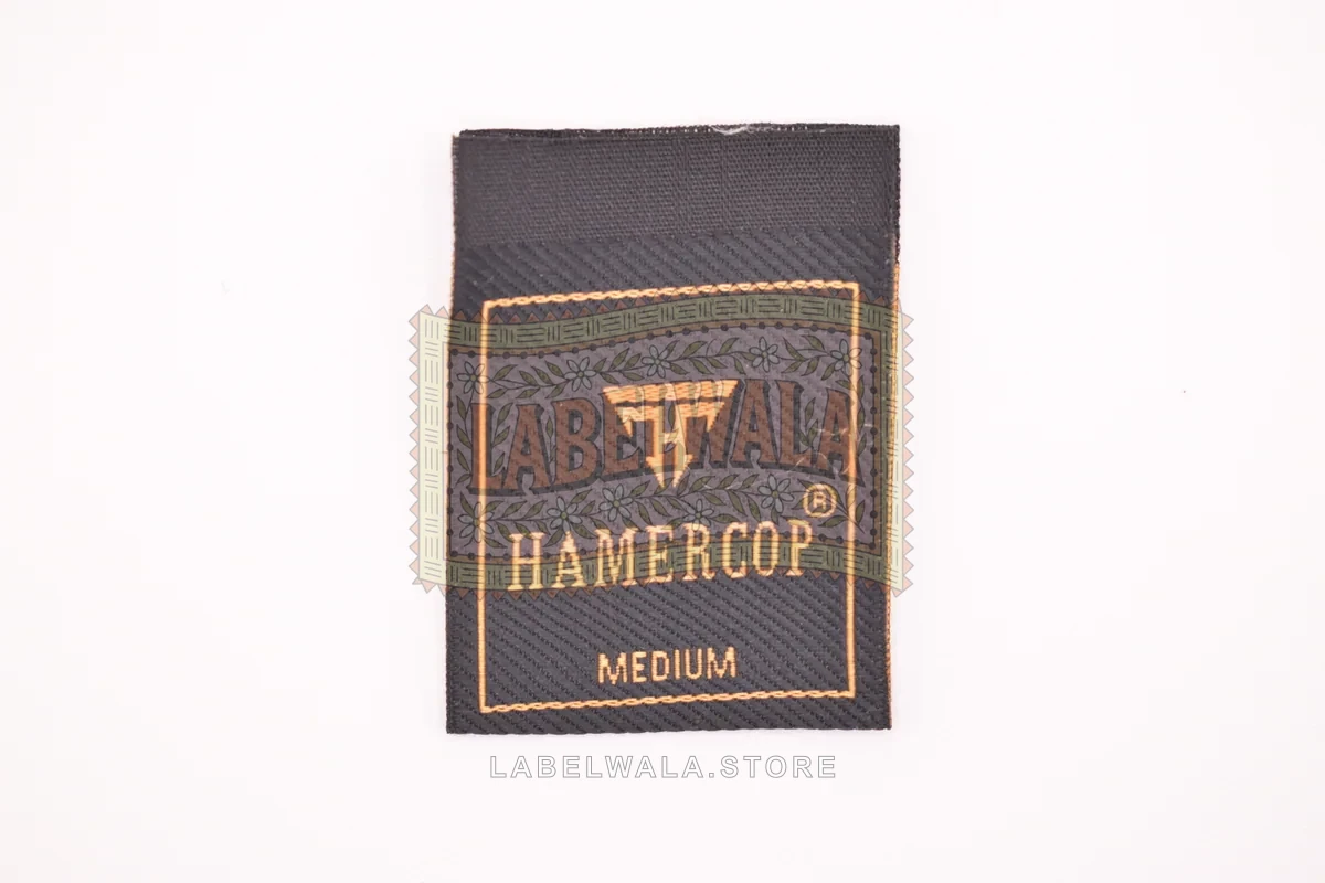 Hamercop woven center fold label, made in Ahmedabad: front view