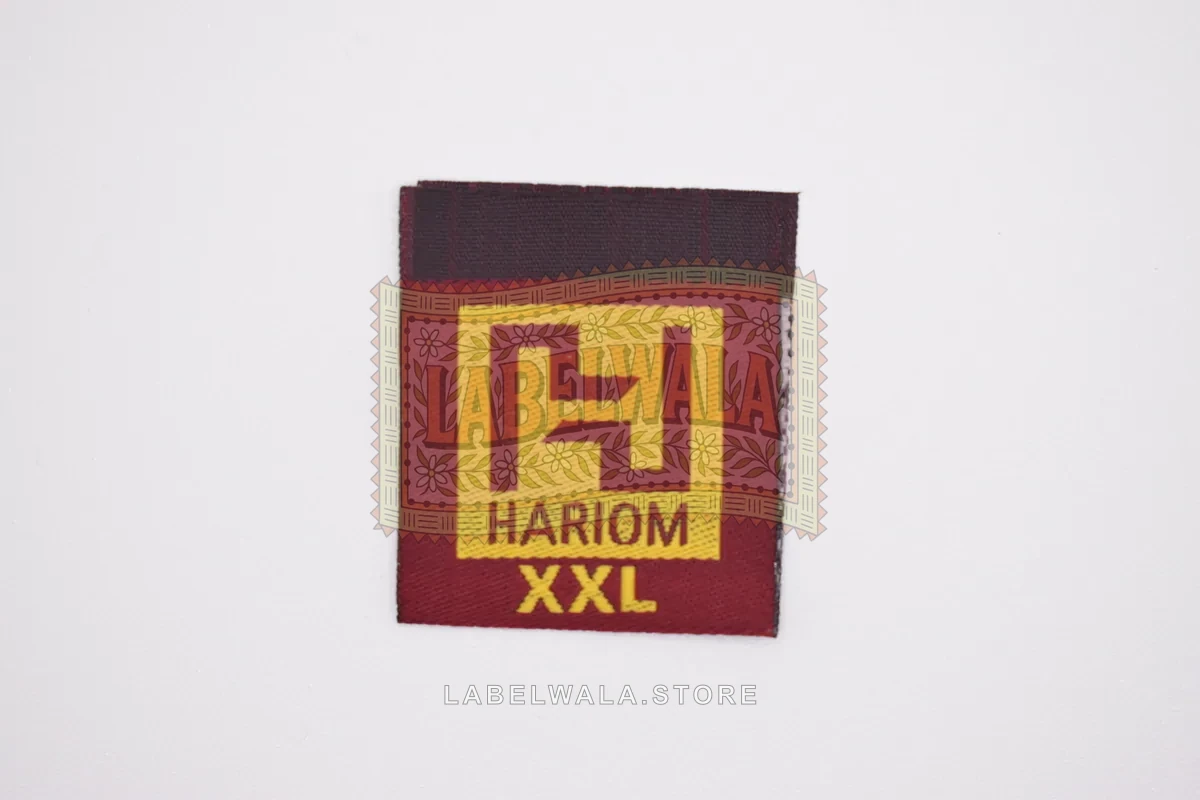 Hariom woven center fold label, made in Ahmedabad: front view