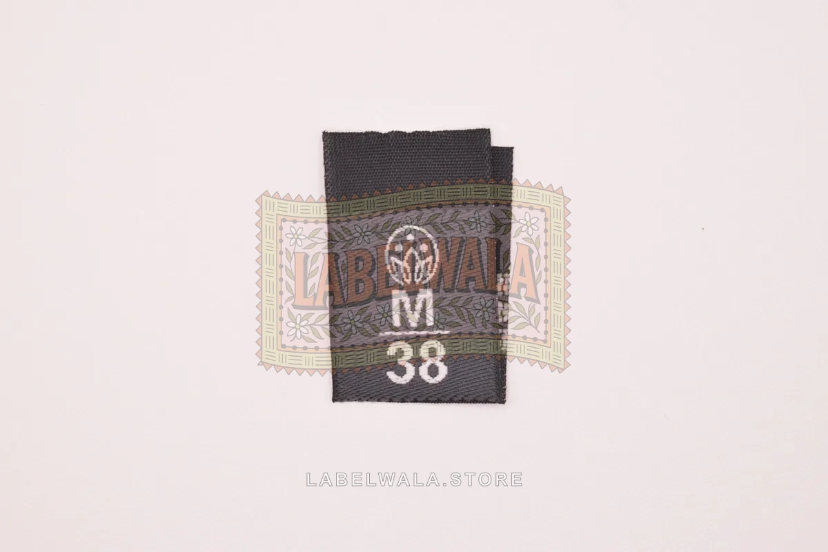 MM38 woven center fold label, made in Ahmedabad: front view
