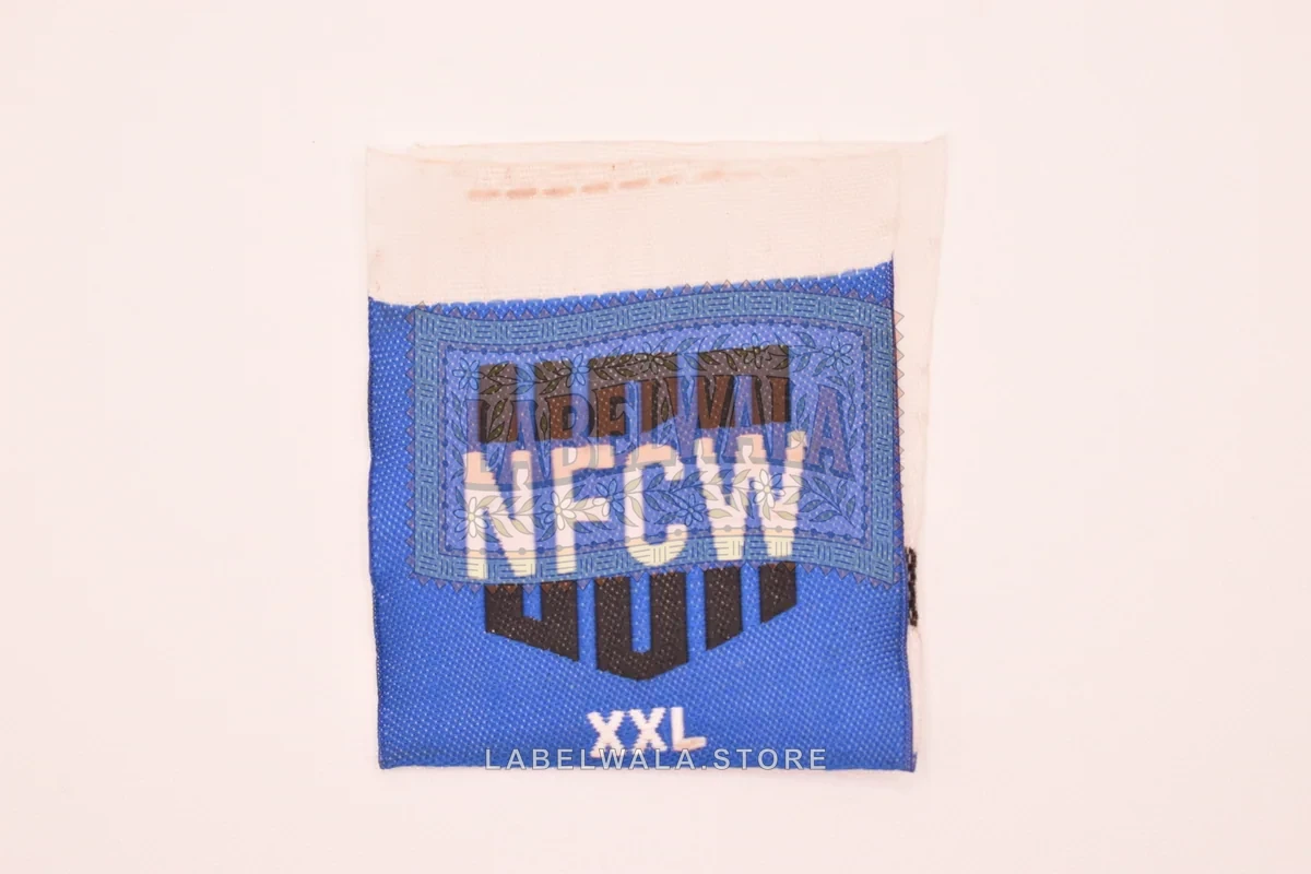 NFCW woven center fold label, made in Ahmedabad: front view