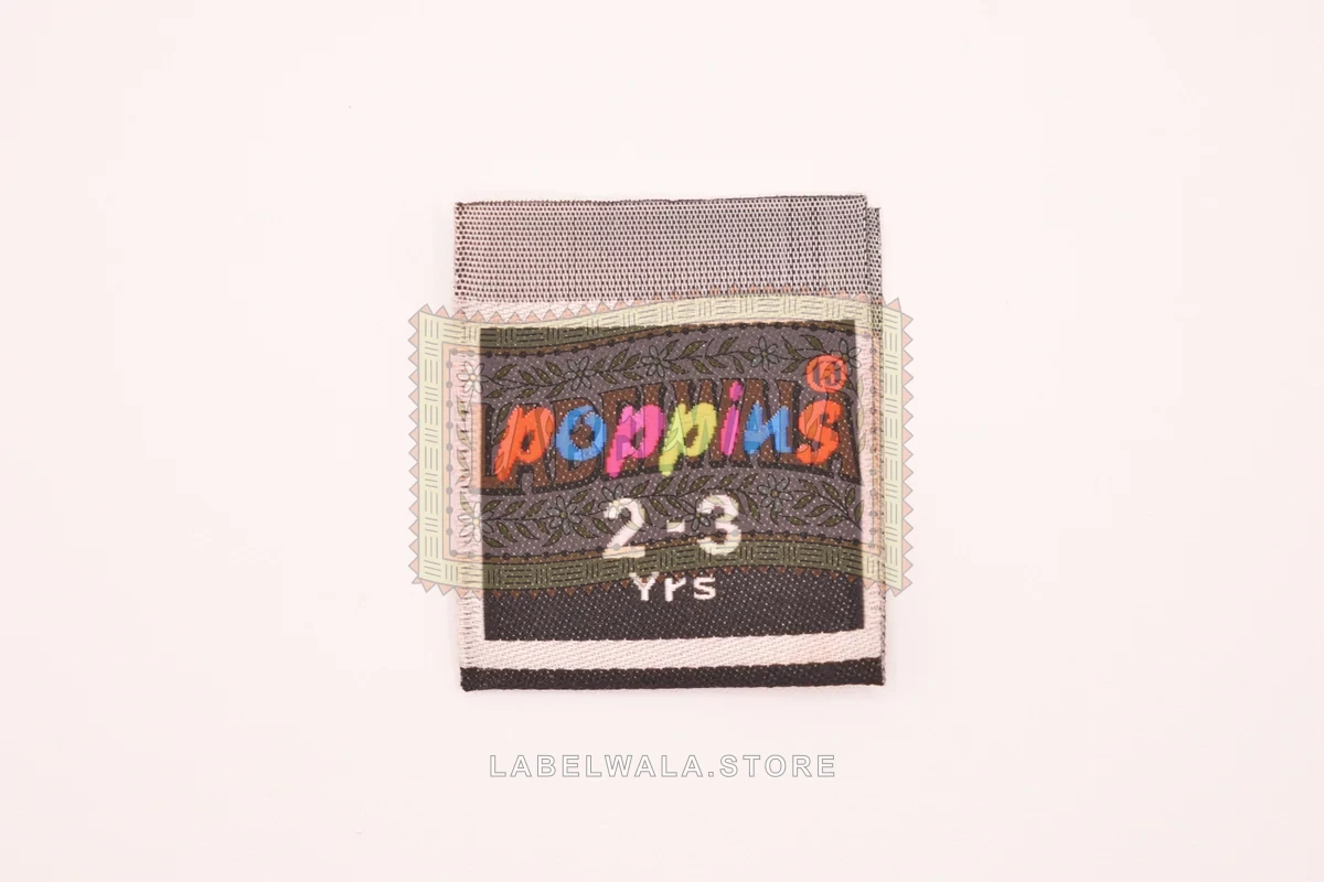 Poppins woven center fold label, made in Ahmedabad: front view