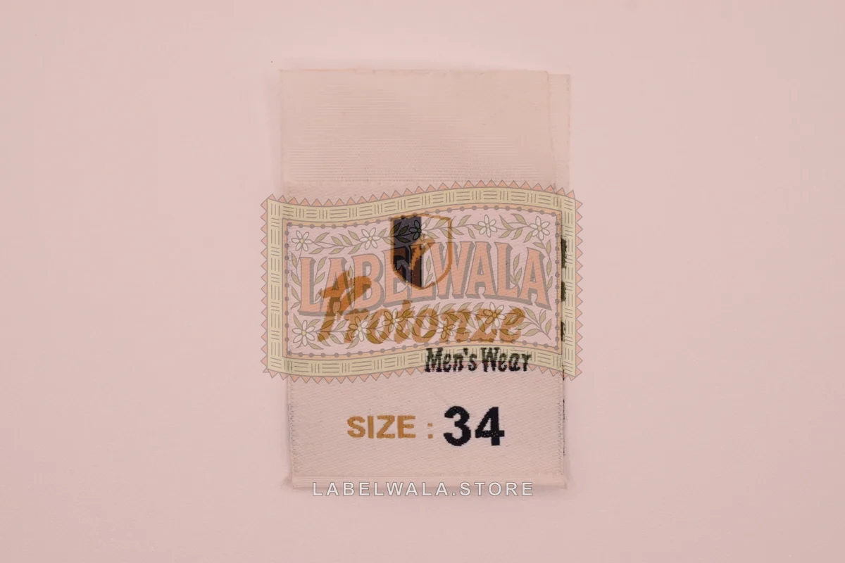 Protonze woven center fold label, made in Ahmedabad: front view