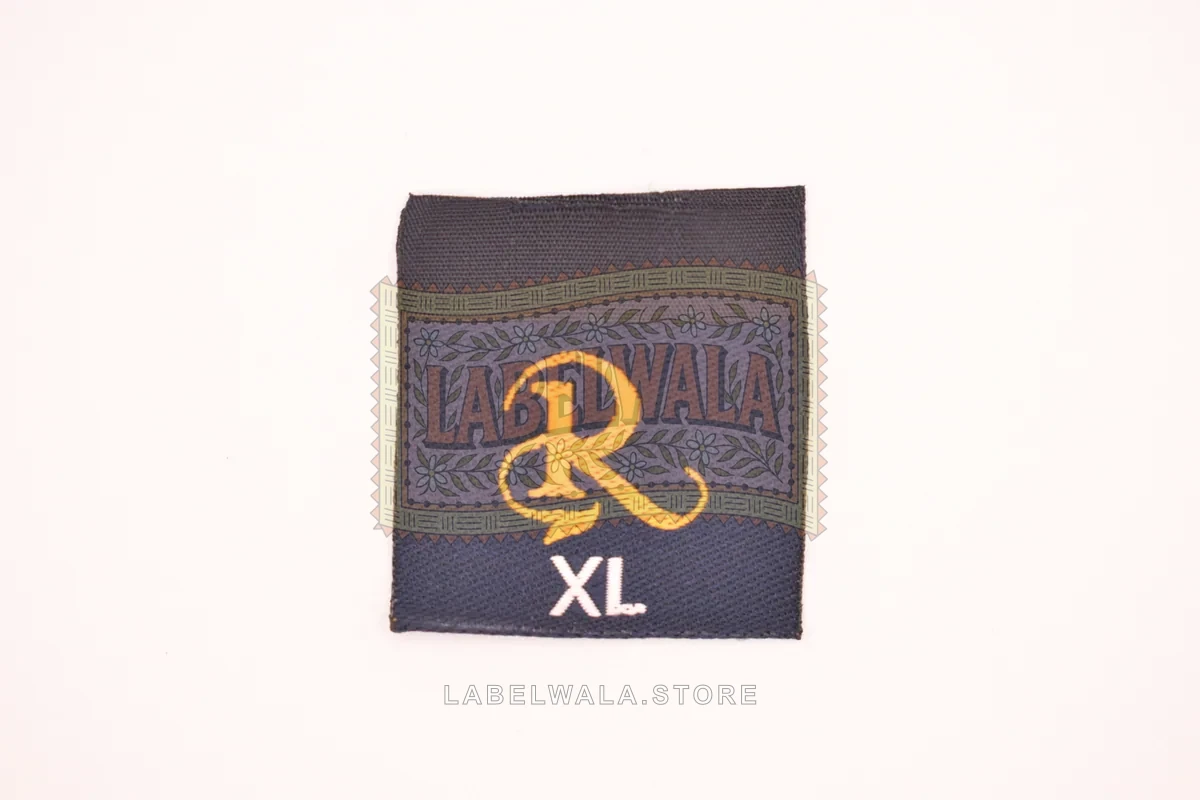 R XL woven center fold label, made in Ahmedabad: front view