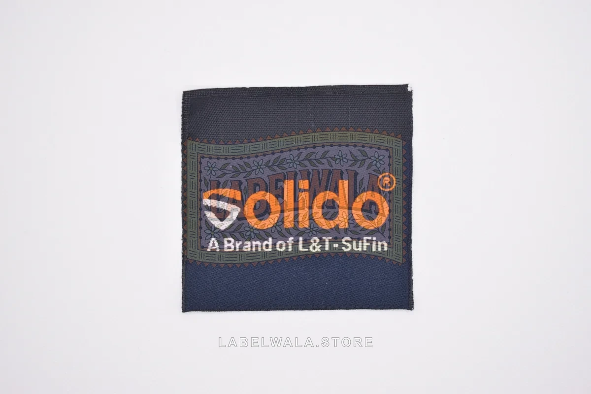 Solido woven center fold label, made in Ahmedabad: front view
