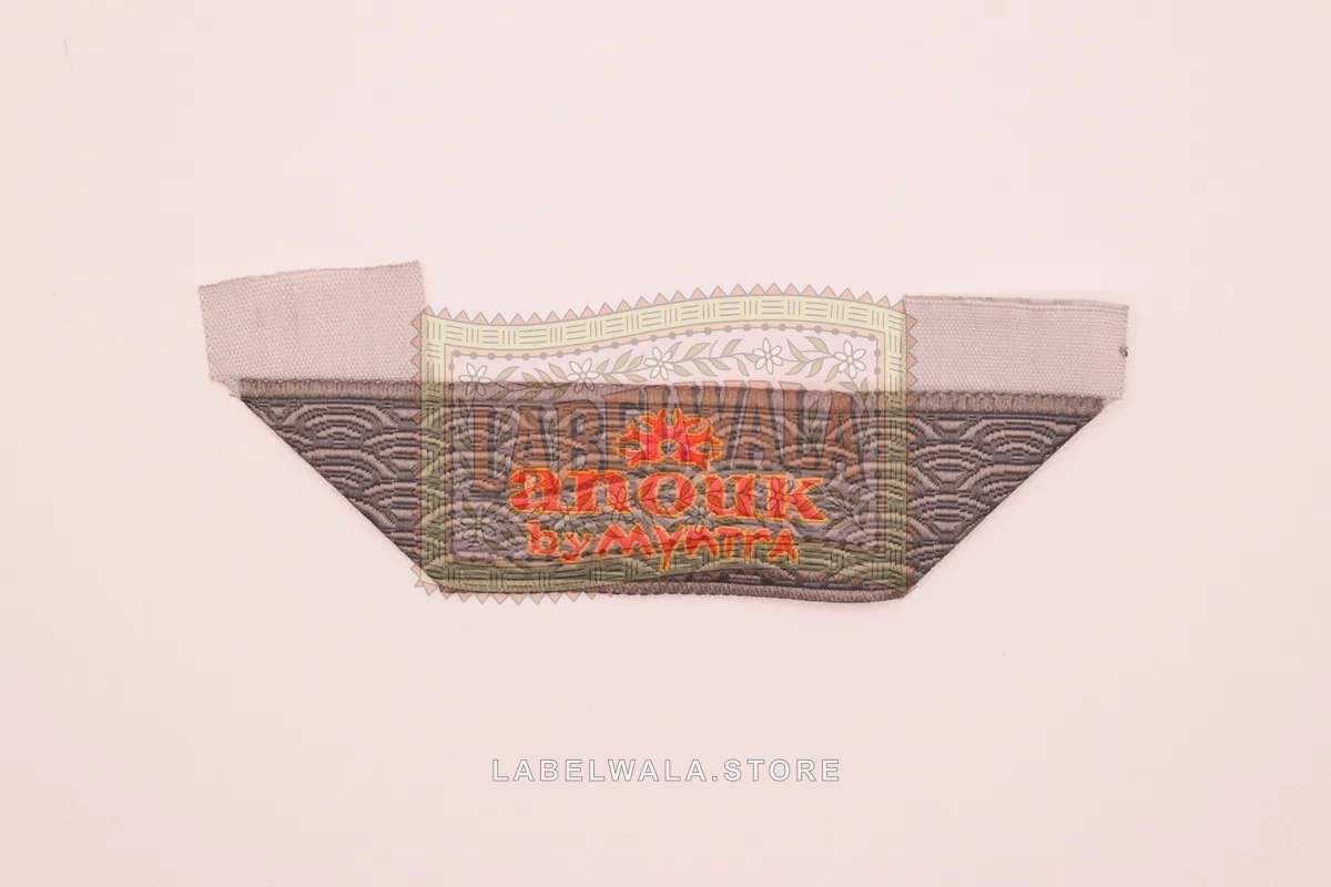 Anouk woven hanger loop label, made in Ahmedabad: front view