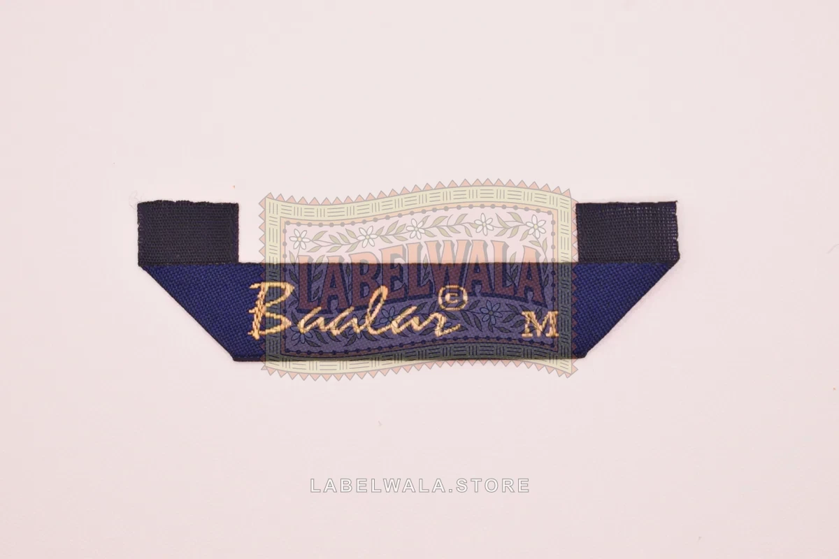 Baalar woven hanger loop label, made in Ahmedabad: front view