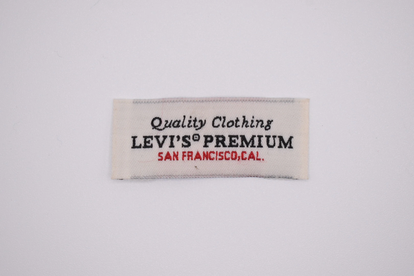 Levi's Premium end-fold woven brand label: front view, design reference woven label sample