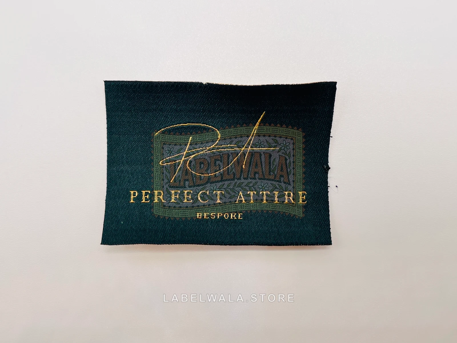 Perfect Attire — Big woven straight cut label, made in Ahmedabad: front view