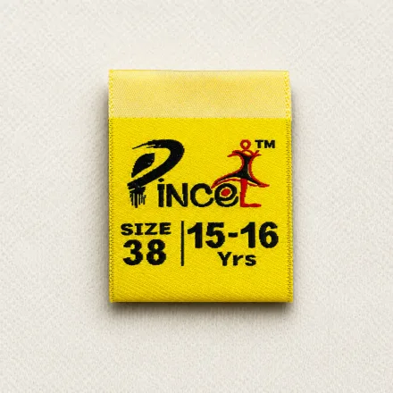 Pincol yellow centre-fold woven size label with brand logo, SIZE 38 and 15-16 Yrs age marker, kids garment woven size label sample
