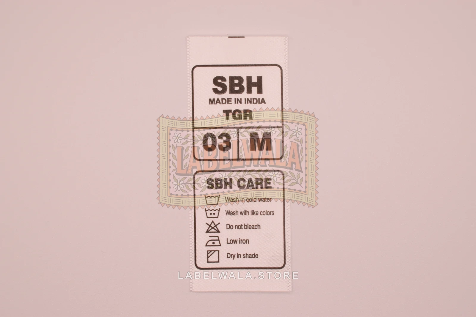 SBH satin center fold label, made in Ahmedabad: front view
