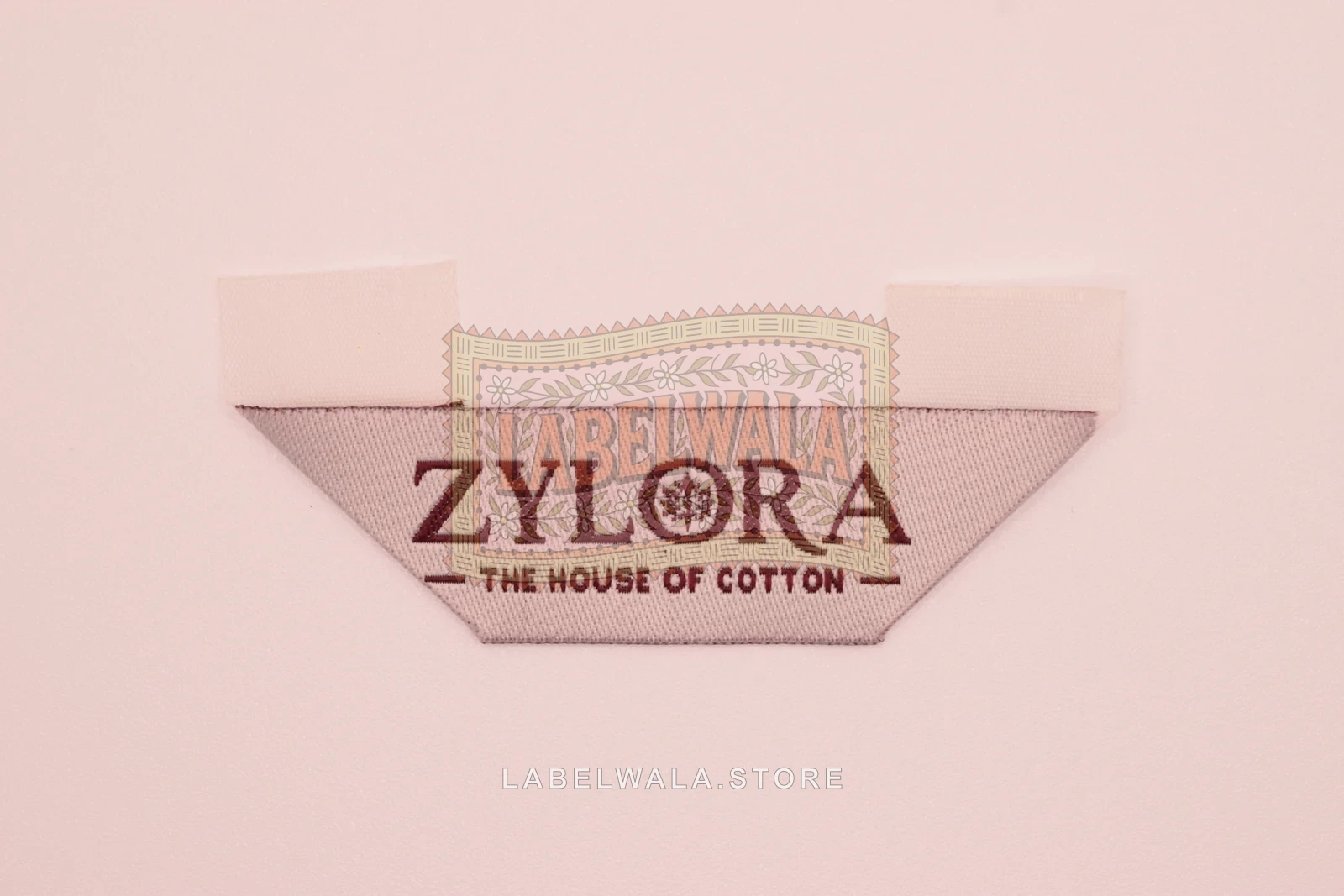 Zylora woven hanger loop label, made in Ahmedabad: front view